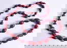 A BEADED NECKLACE. 98 grams. 88 cm long, largest bead 2.75 cm x 1.5 cm.