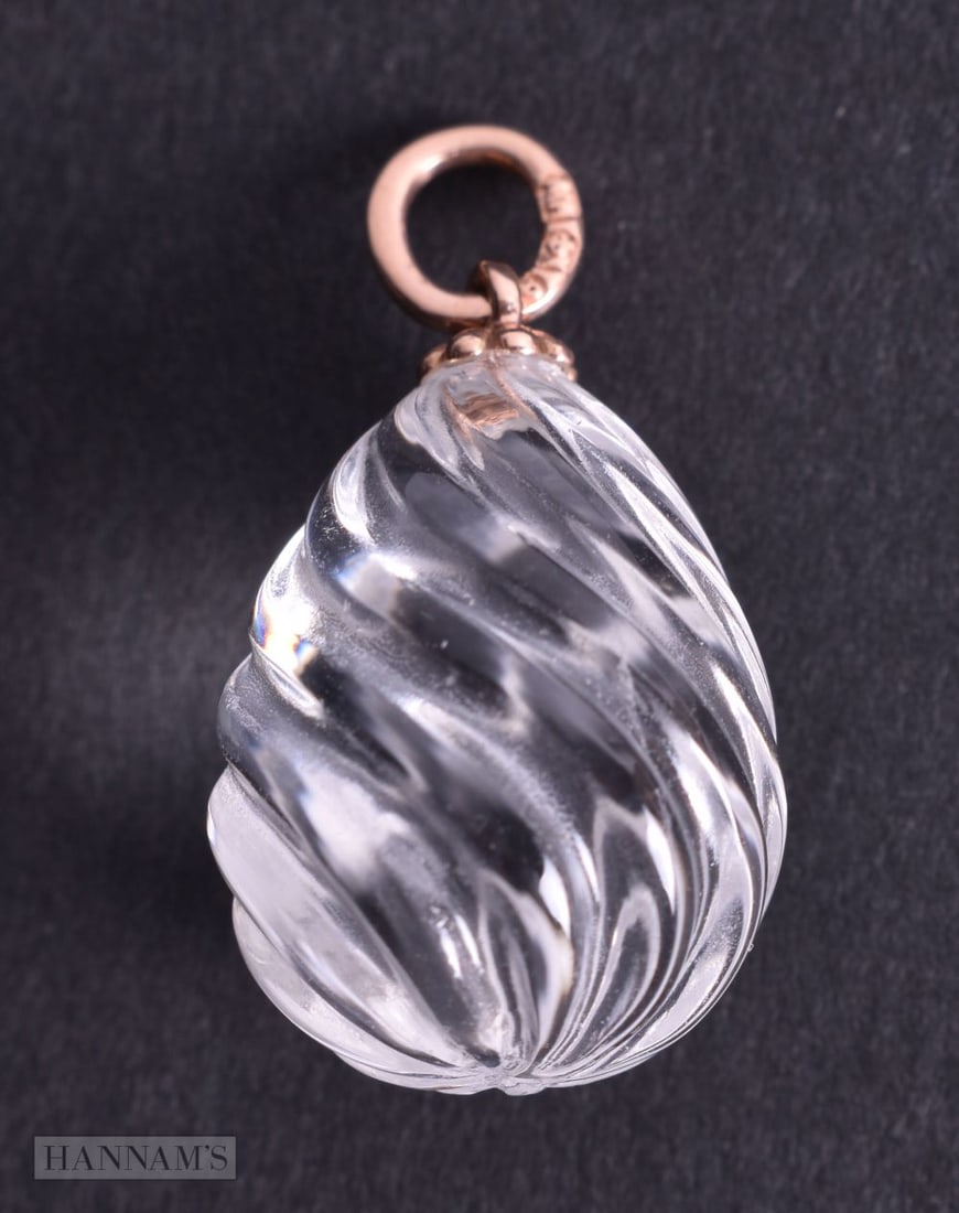 A Rock Crystal Pendant with Gold Mount.  Stamped 56.  2.8cm x 1.5cm, weight 6.5g (1 of 2)