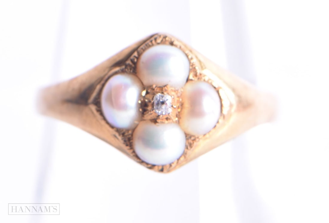 An 18 Carat Gold Victorian Ring set with Pearls and a Diamond.  Size N, weight 2.8g (1 of 2)