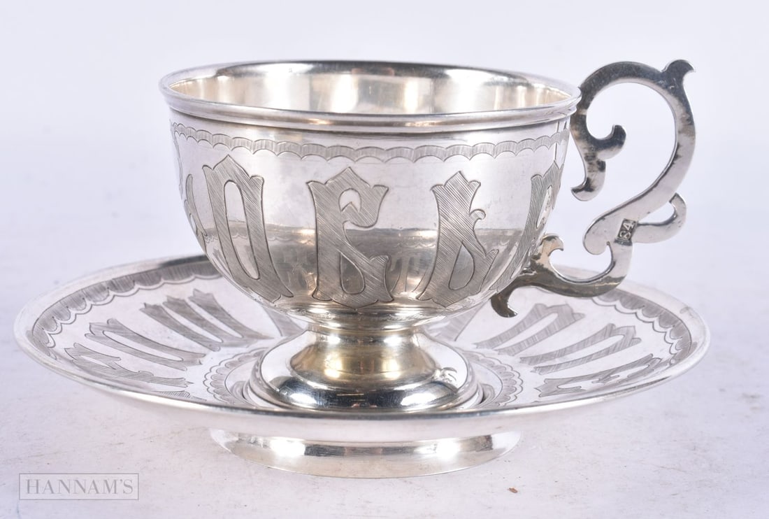 AN ANTIQUE RUSSIAN SILVER CUP AND SAUCER. 249 grams. 10.5 cm diameter. (1 of 4)