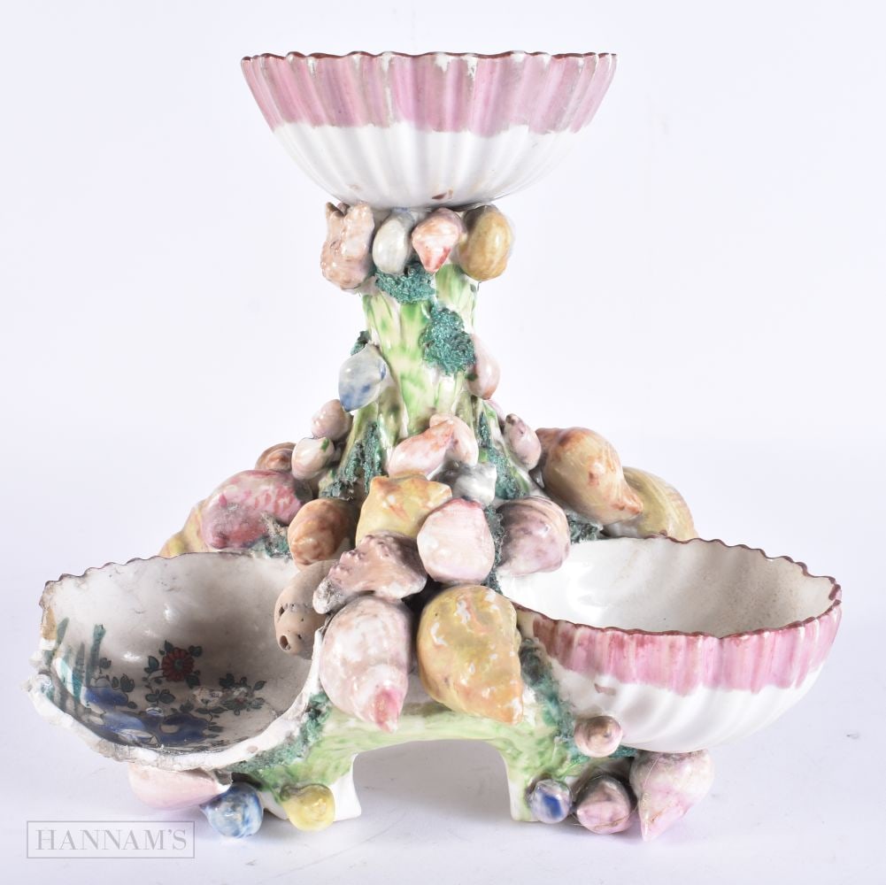 A RARE 18TH CENTURY ENGLISH PORCELAIN SHELL SWEETMEAT DISH possibly Plymouth, modelled with numerous: A RARE 18TH CENTURY ENGLISH PORCELAIN SHELL SWEETMEAT DISH possibly Plymouth, modelled with numerous shells painted with floral sprays. 19 cm x 19 cm.