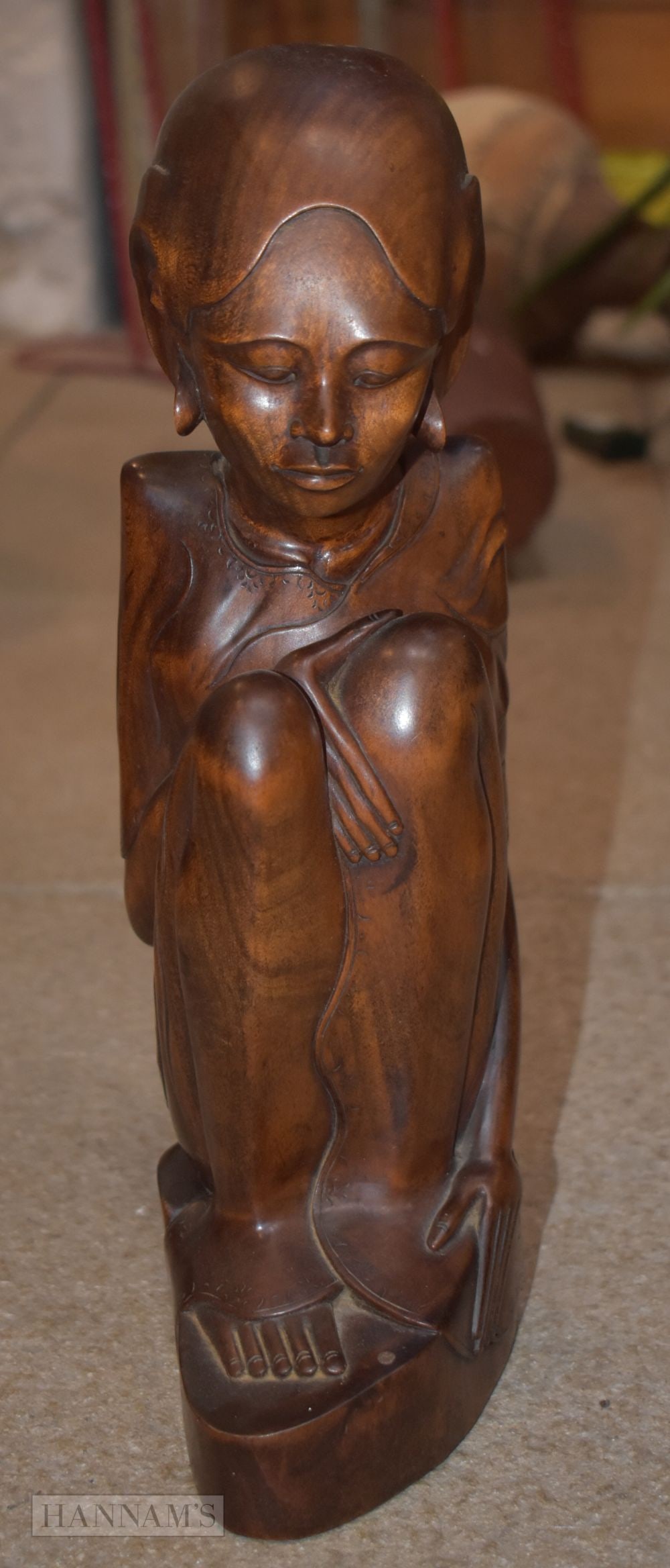 A FINELY CARVED BALINESE FIGURE OF A FEMALE. 33 cm high.: A FINELY CARVED BALINESE FIGURE OF A FEMALE. 33 cm high.