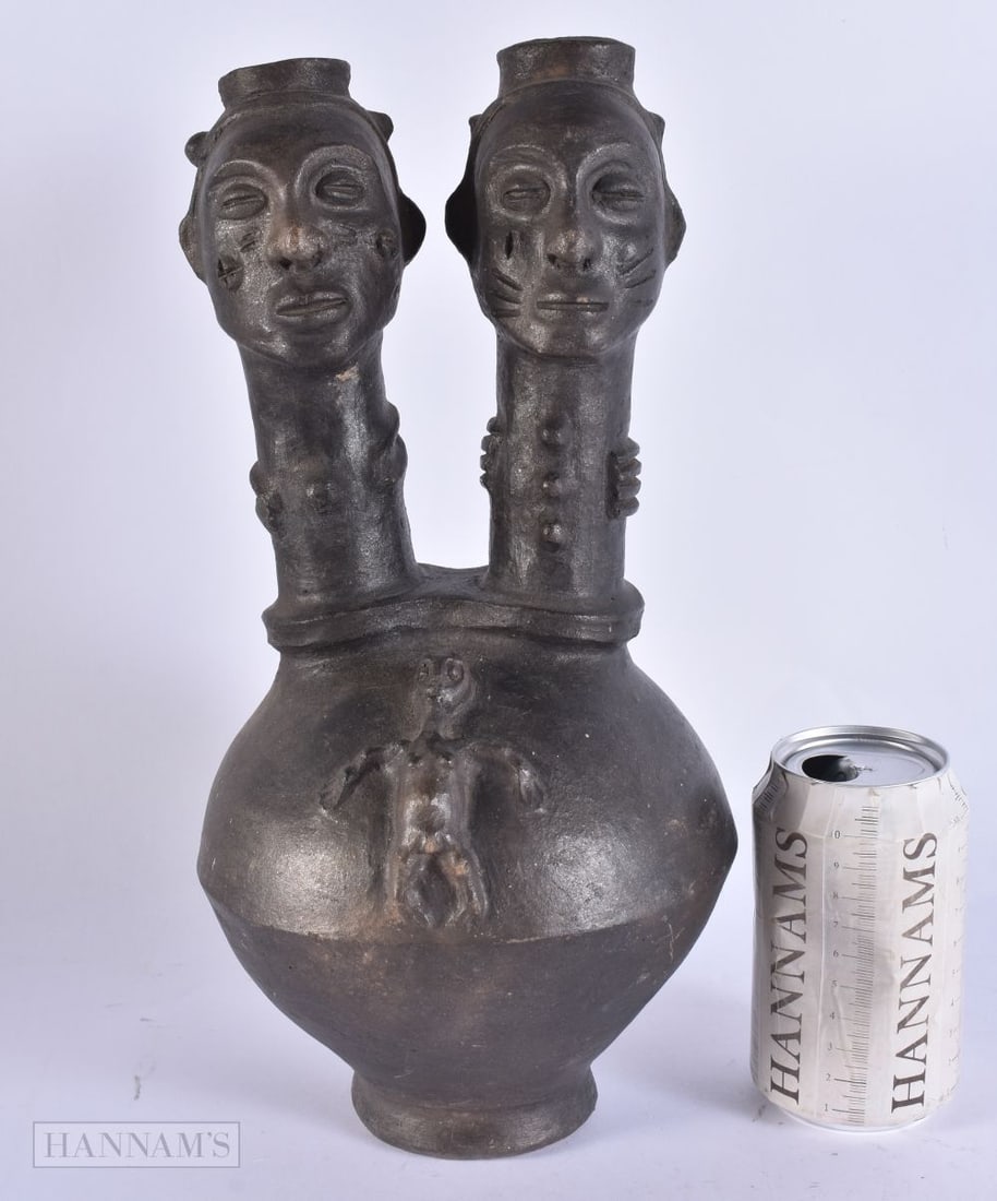 AN AFRICAN GHANA/IVORY COAST ANYI TRIBAL TERRACOTTA VESSEL. 34 cm x 14 cm.: AN AFRICAN GHANA/IVORY COAST ANYI TRIBAL TERRACOTTA VESSEL. 34 cm x 14 cm.