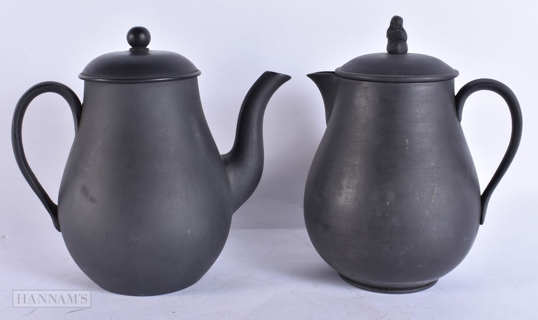 TWO WEDGWOOD BLACK BASALT TEAPOTS AND COVERS. 19 cm high. (2) (1 of 6)