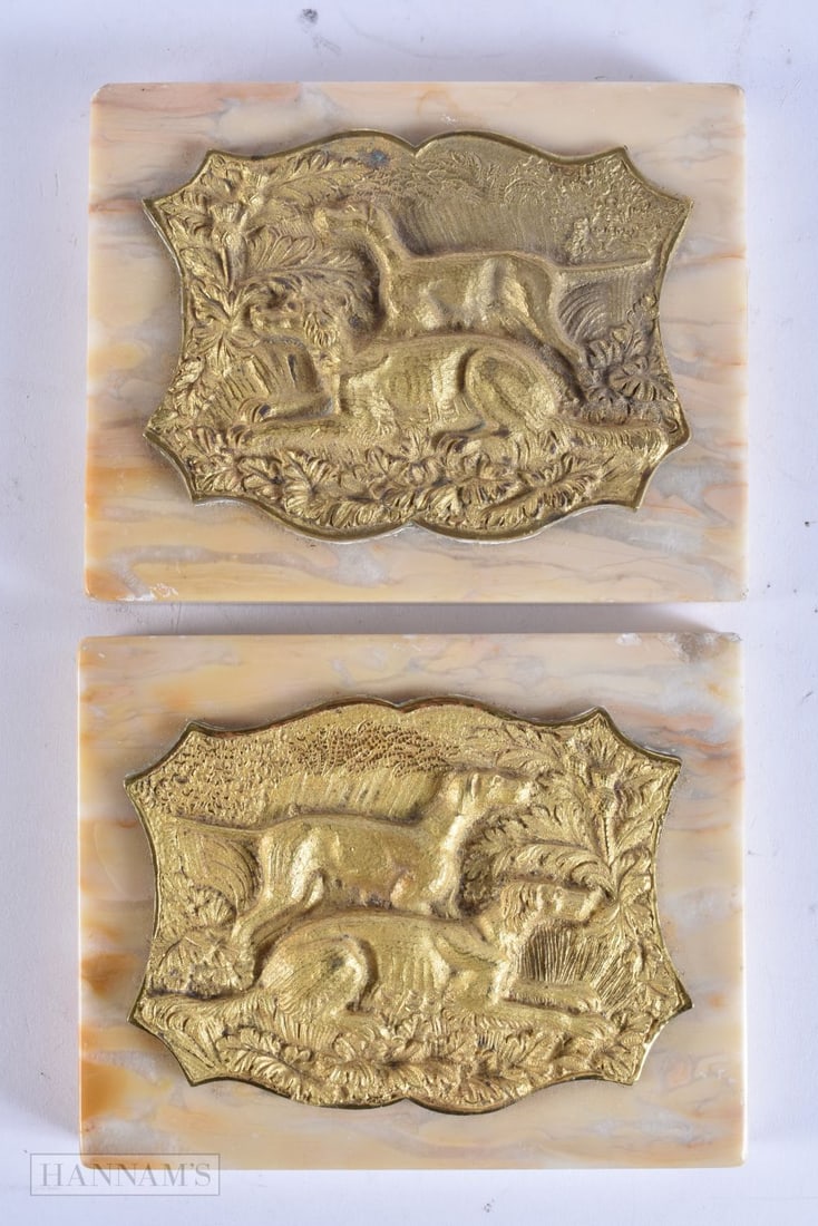 A PAIR OF 19TH CENTURY FRENCH GILT BRONZE AND MARBLE PLAQUES depicting hunting hounds in relief. 15: A PAIR OF 19TH CENTURY FRENCH GILT BRONZE AND MARBLE PLAQUES depicting hunting hounds in relief. 15 cm x 12 cm.