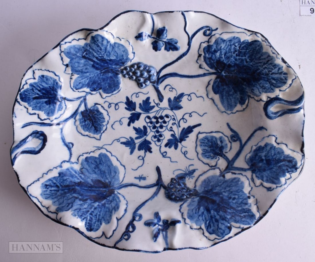 18th century Bow oval undulating stand moulded with leaves and painted with grapes. 26cm wide: 18th century Bow oval undulating stand moulded with leaves and painted with grapes. 26cm wide