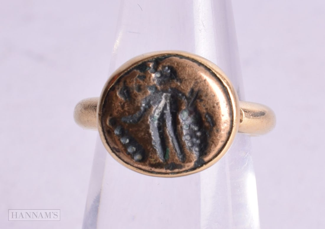 A HIGH CARAT GOLD ANTIQUITY ROMAN BRONZE SEAL RING. 6.1 grams. I. (1 of 2)