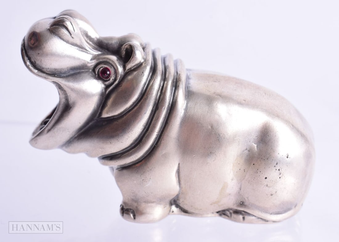 A CONTINENTAL SILVER HIPPO.  Stamped 84, 5cm x 7.6cm x 3.3cm, weight 78g (1 of 4)
