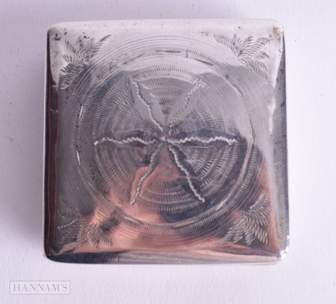 A CONTINENTAL SILVER PILL BOX WITH ENGRAVED DECORATION. Dutch Marks. 1.6cm x 4.5cm x 4.5cm, weight: A CONTINENTAL SILVER PILL BOX WITH ENGRAVED DECORATION. Dutch Marks. 1.6cm x 4.5cm x 4.5cm, weight 21.9g