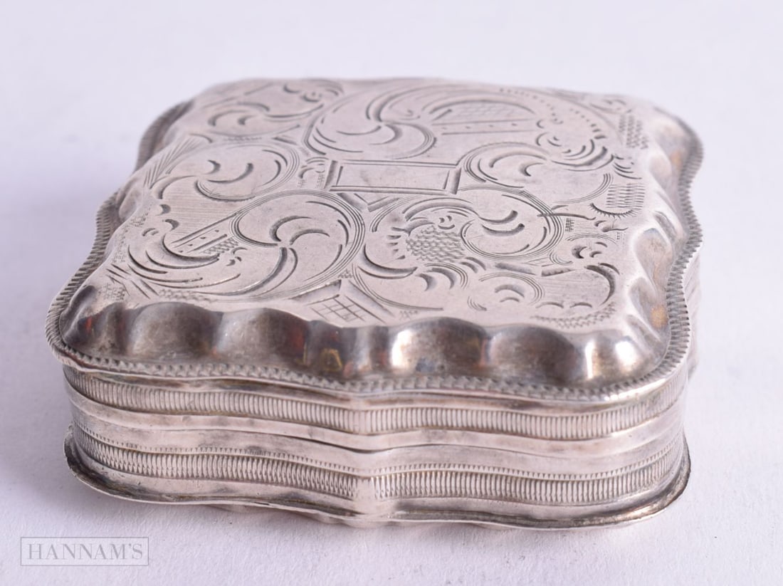 A CONTINENTAL SILVER PILL BOX WITH ENGRAVED DECORATION. Dutch Marks. 2cm x 5.2cm x 5.2cm, weight 28: A CONTINENTAL SILVER PILL BOX WITH ENGRAVED DECORATION. Dutch Marks. 2cm x 5.2cm x 5.2cm, weight 28.5g