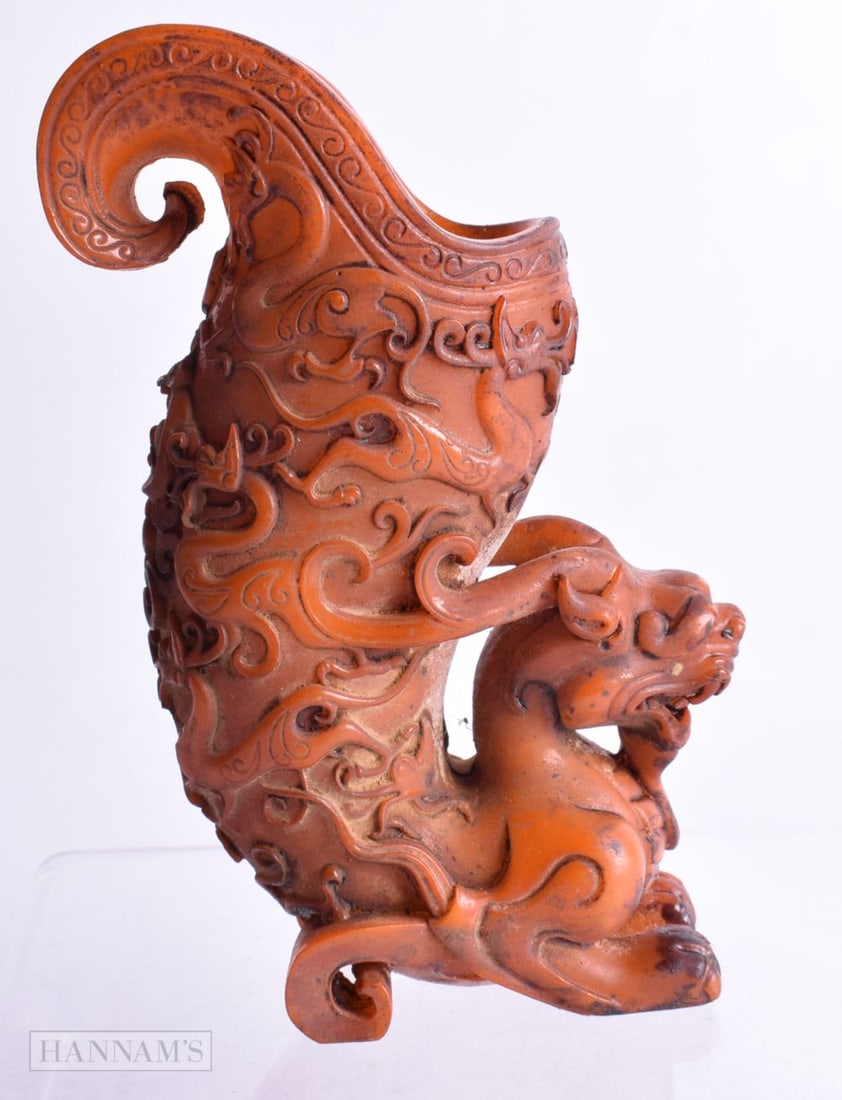 A CHINESE LIBATION CUP IN THE FORM OF A DRAGON.  13cm x 8cm x 4cm, weight 219.7g (1 of 5)