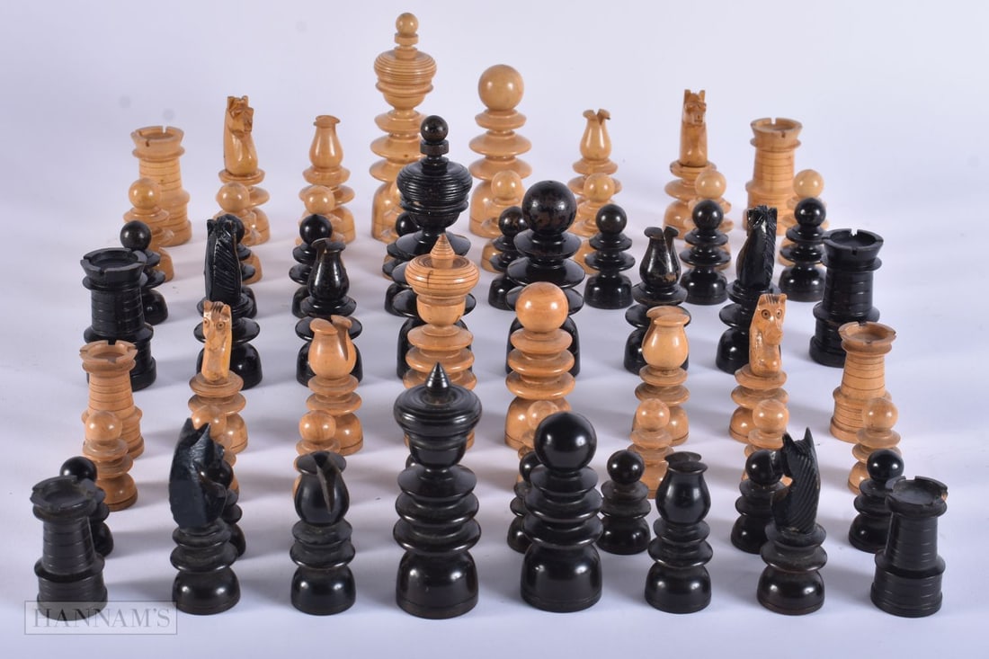 Two antique Hand Made Chess Sets Wood Turned & Carved Pieces w/ Wooden Box. Largest 9.75 cm high. (q: Two antique Hand Made Chess Sets Wood Turned & Carved Pieces w/ Wooden Box. Largest 9.75 cm high. (qty)