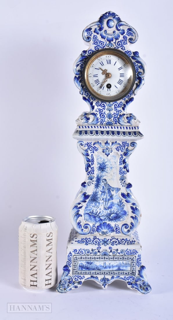 A LARGE ANTIQUE DELFT BLUE AND WHITE POTTERY LONGCASE CLOCK painted with figures. 45 cm high. (1 of 8)