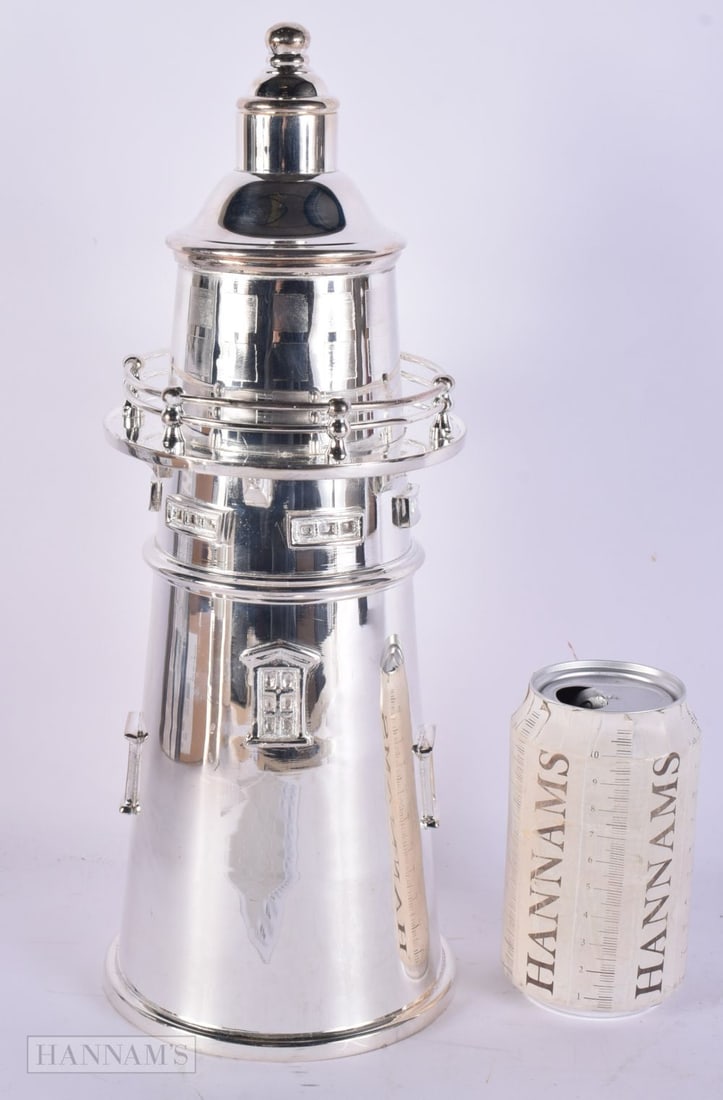 A SILVER PLATED LIGHTHOUSE COCKTAIL SHAKER. 34 cm high. (1 of 5)