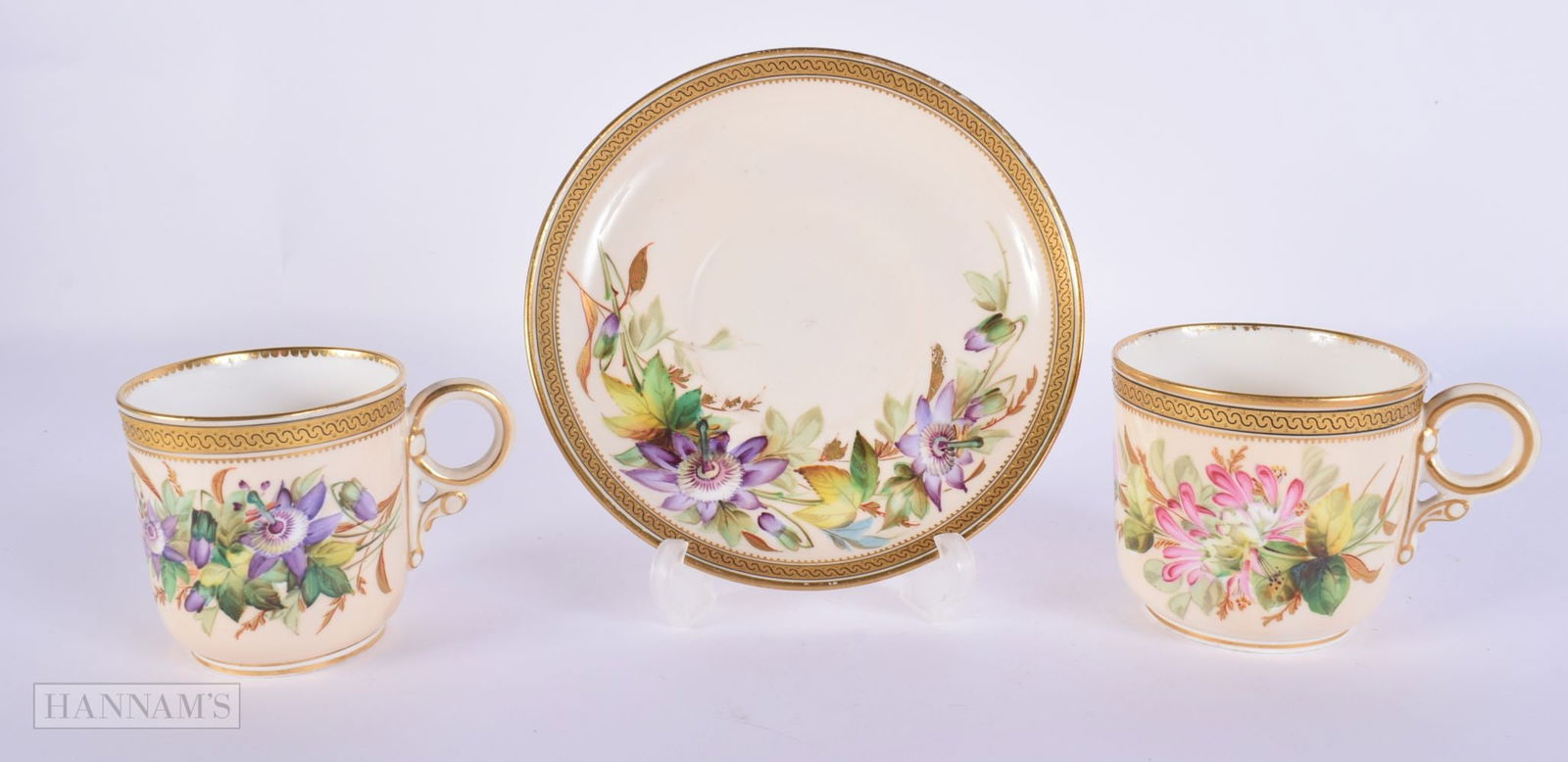 Royal Worcester coffee cup, teacup and saucer painted with flowers by David Bates, date mark for 188: Royal Worcester coffee cup, teacup and saucer painted with flowers by David Bates, date mark for 1881, Bates left in the early 1880?s to join the Royal Academy.13.5 cm diameter (3)