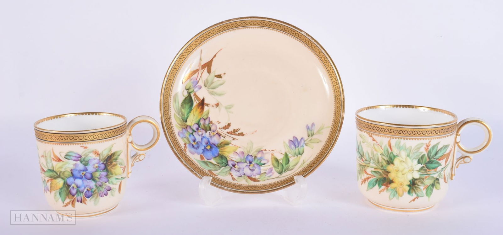 Royal Worcester coffee cup, teacup and saucer painted with flowers by David Bates, date mark for 188: Royal Worcester coffee cup, teacup and saucer painted with flowers by David Bates, date mark for 1881, Bates left in the early 1880?s to join the Royal Academy.13.5 cm diameter (3)