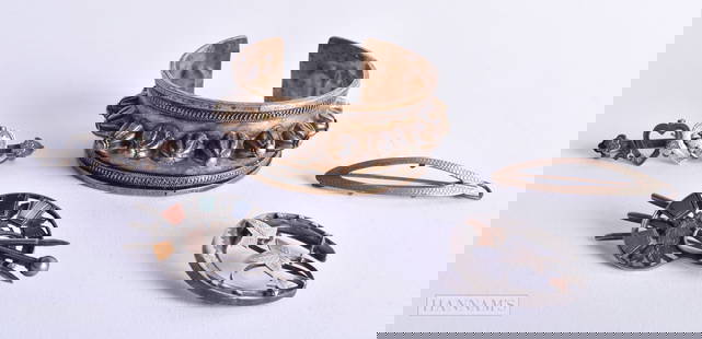 A MIDDLE EASTERN CUFF BANGLE together with silver brooches. Silver 15 grams, bangle 34.5 grams. (qty: A MIDDLE EASTERN CUFF BANGLE together with silver brooches. Silver 15 grams, bangle 34.5 grams. (qty)