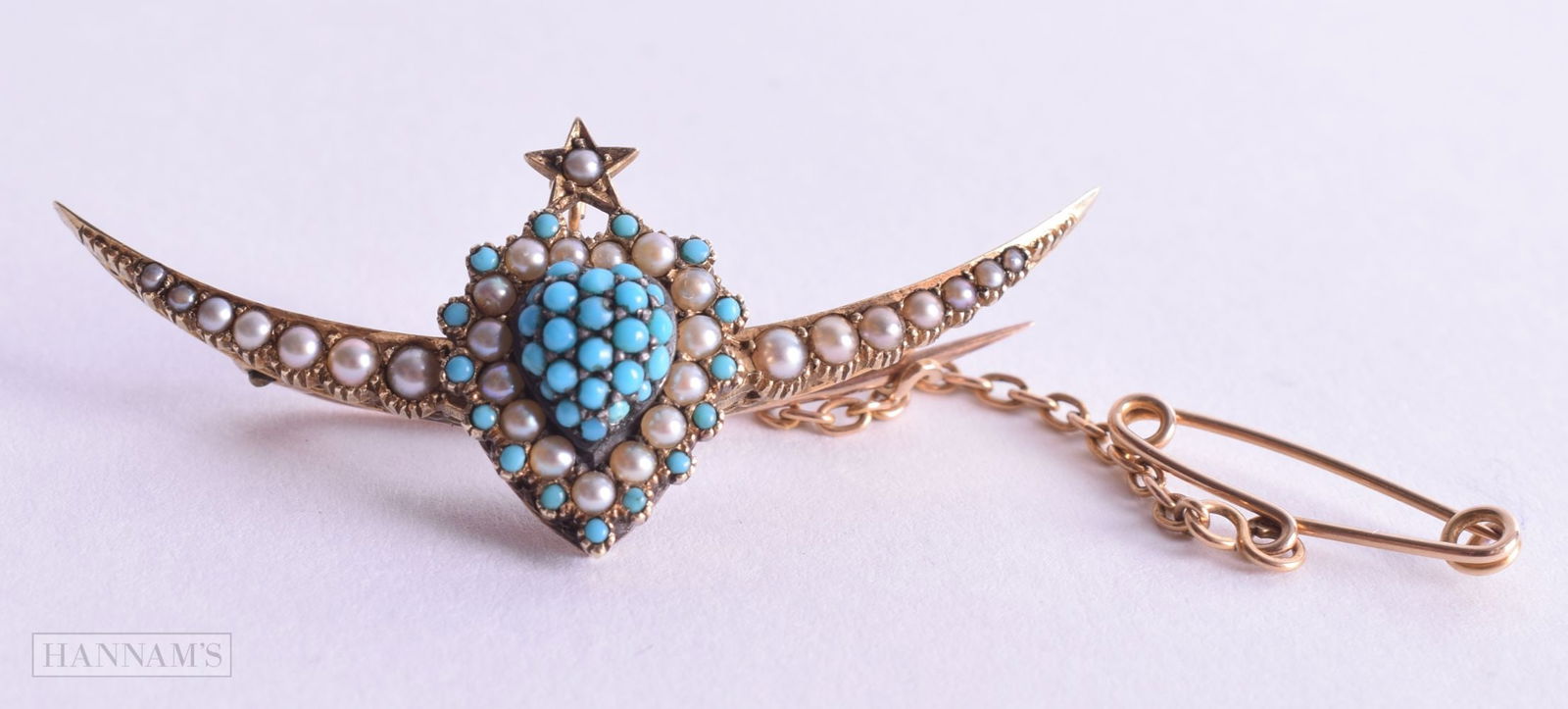 A 15CT GOLD PEARL AND TURQUOISE BROOCH. 5.9 grams. 1.75 cm x 4.25 cm. (1 of 3)