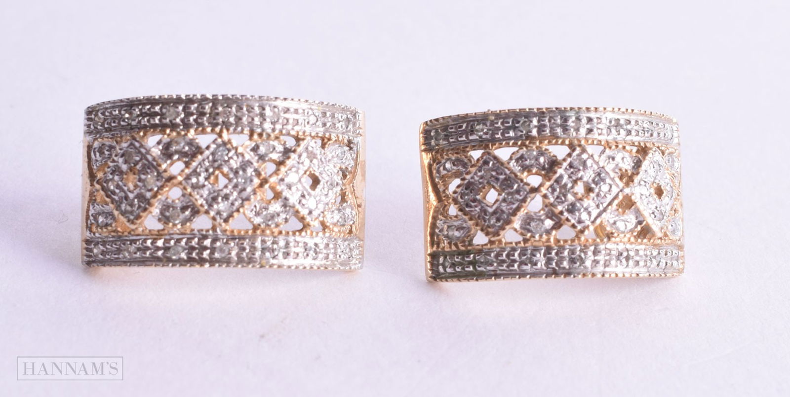 A PAIR OF 9CT GOLD EARRINGS. 5.1 grams. 2 cm x 1.25 cm. (1 of 2)