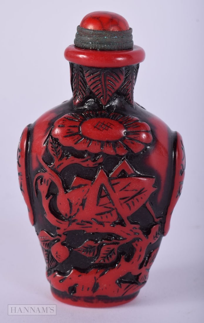 A CHINESE RED LACQUER SNUFF BOTTLE. 69 grams. 8.5 cm high. (1 of 5)