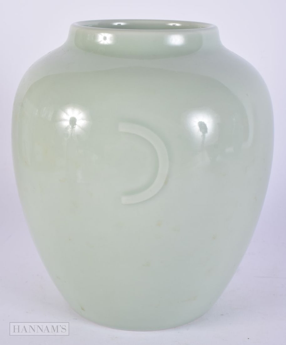 A CHINESE CELADON GLAZED JAR. 20 cm high. (1 of 4)