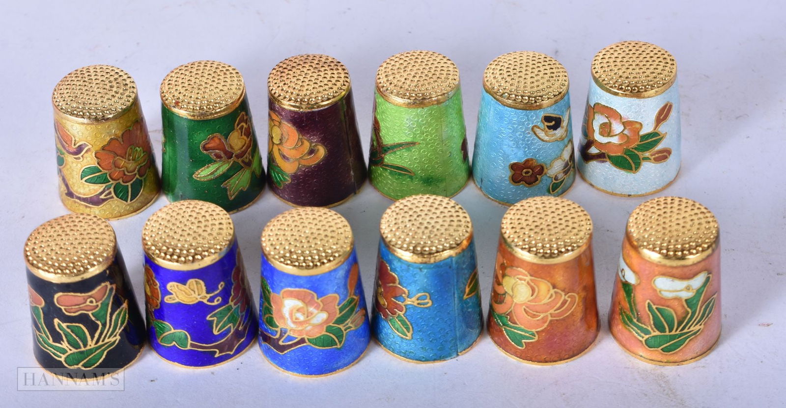 A collection of Chinese cloisonne enamelled thimbles (12) 2.6cm: A collection of Chinese cloisonne enamelled thimbles (12) 2.6cm