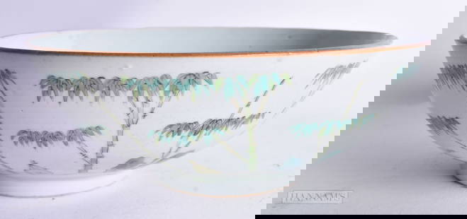 A 19TH CENTURY CHINESE FAMILLE ROSE PORCELAIN LANDSCAPE BOWL Late Qing, painted with calligraphy. 19: A 19TH CENTURY CHINESE FAMILLE ROSE PORCELAIN LANDSCAPE BOWL Late Qing, painted with calligraphy. 19 cm wide.