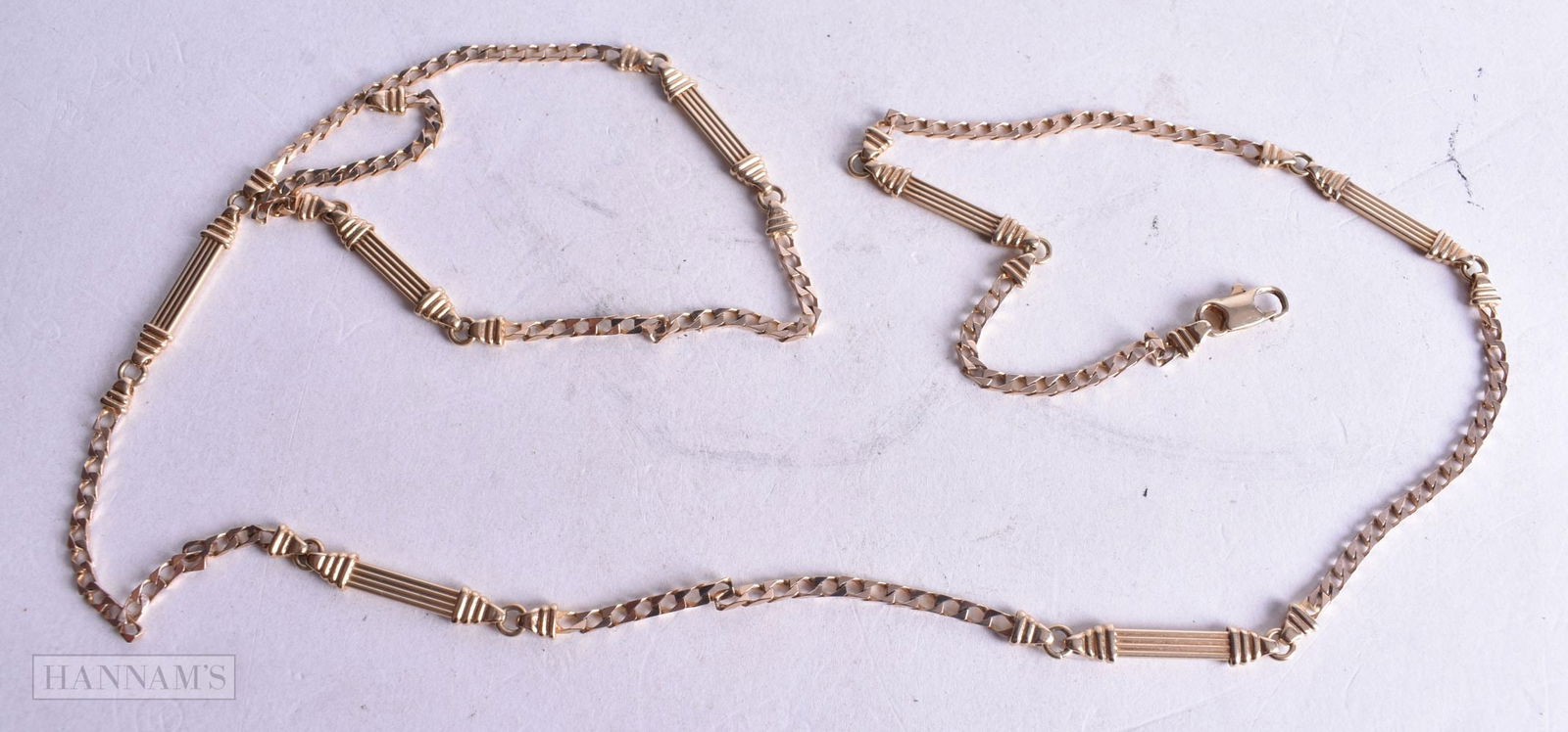 A 9CT GOLD NECKLACE. 16.9 grams. 73 cm long. (1 of 3)