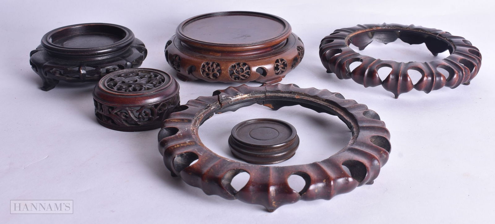 FIVE CHINESE CARVED HARDWOOD STANDS together with a similar hardwood cover. Largest 15.5 cm wide. (6 (1 of 10)