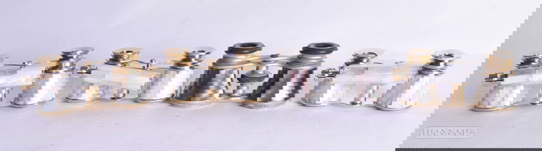 FOUR PAIRS OF MOTHER OF PEARL OPERA GLASSES. Largest 18 cm wide. (4): FOUR PAIRS OF MOTHER OF PEARL OPERA GLASSES. Largest 18 cm wide. (4)