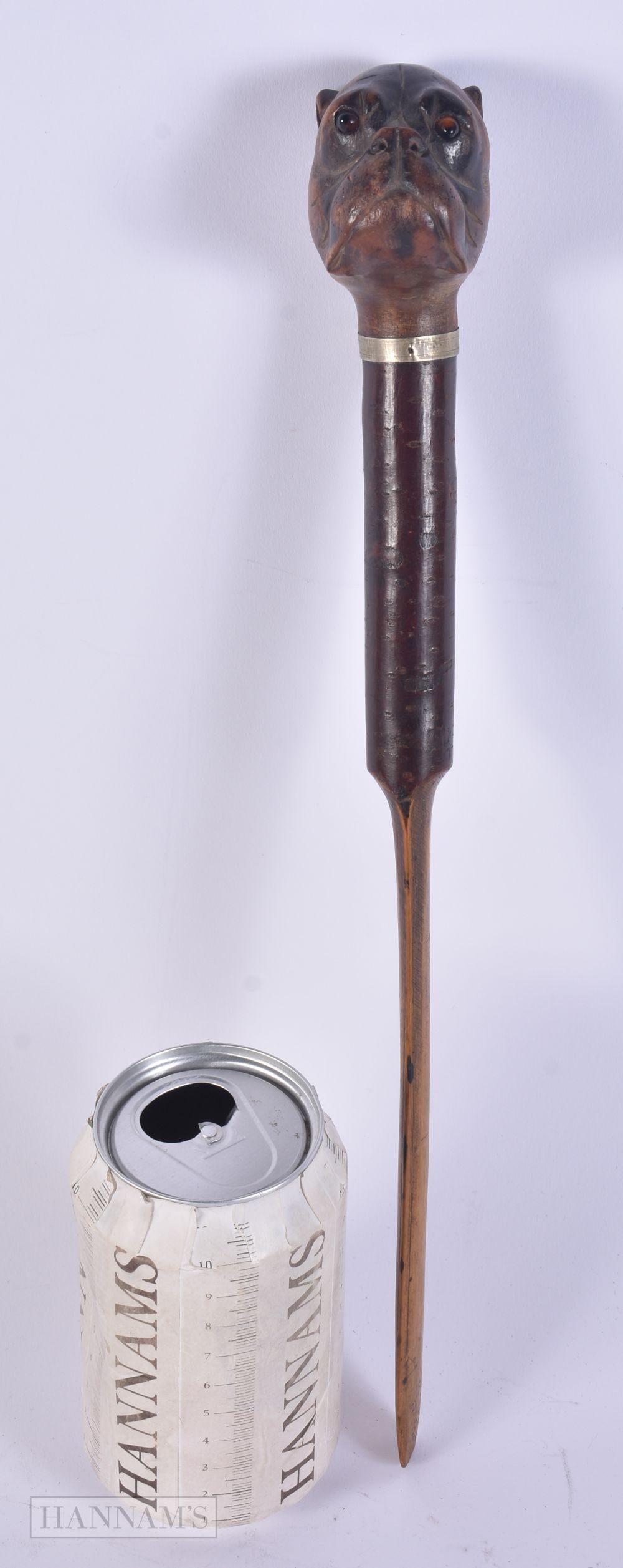 A LARGE 19TH CENTURY BAVARIAN BLACK FOREST CARVED WOOD LETTER OPENER formed as a dog head with glass: A LARGE 19TH CENTURY BAVARIAN BLACK FOREST CARVED WOOD LETTER OPENER formed as a dog head with glass eyes. 34 cm long.