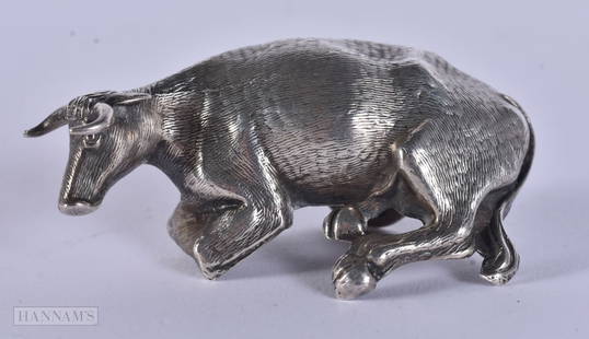 AN EARLY 19TH CENTURY ENGLISH SILVER COW FINIAL. 19.6 grams. 6.25 cm x 3.5 cm.: AN EARLY 19TH CENTURY ENGLISH SILVER COW FINIAL. 19.6 grams. 6.25 cm x 3.5 cm.