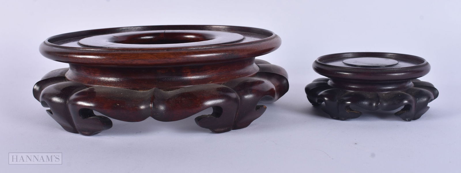 TWO CHINESE CARVED HARDWOOD DISPLAY STANDS. Largest 16 cm wide. (2) (1 of 4)