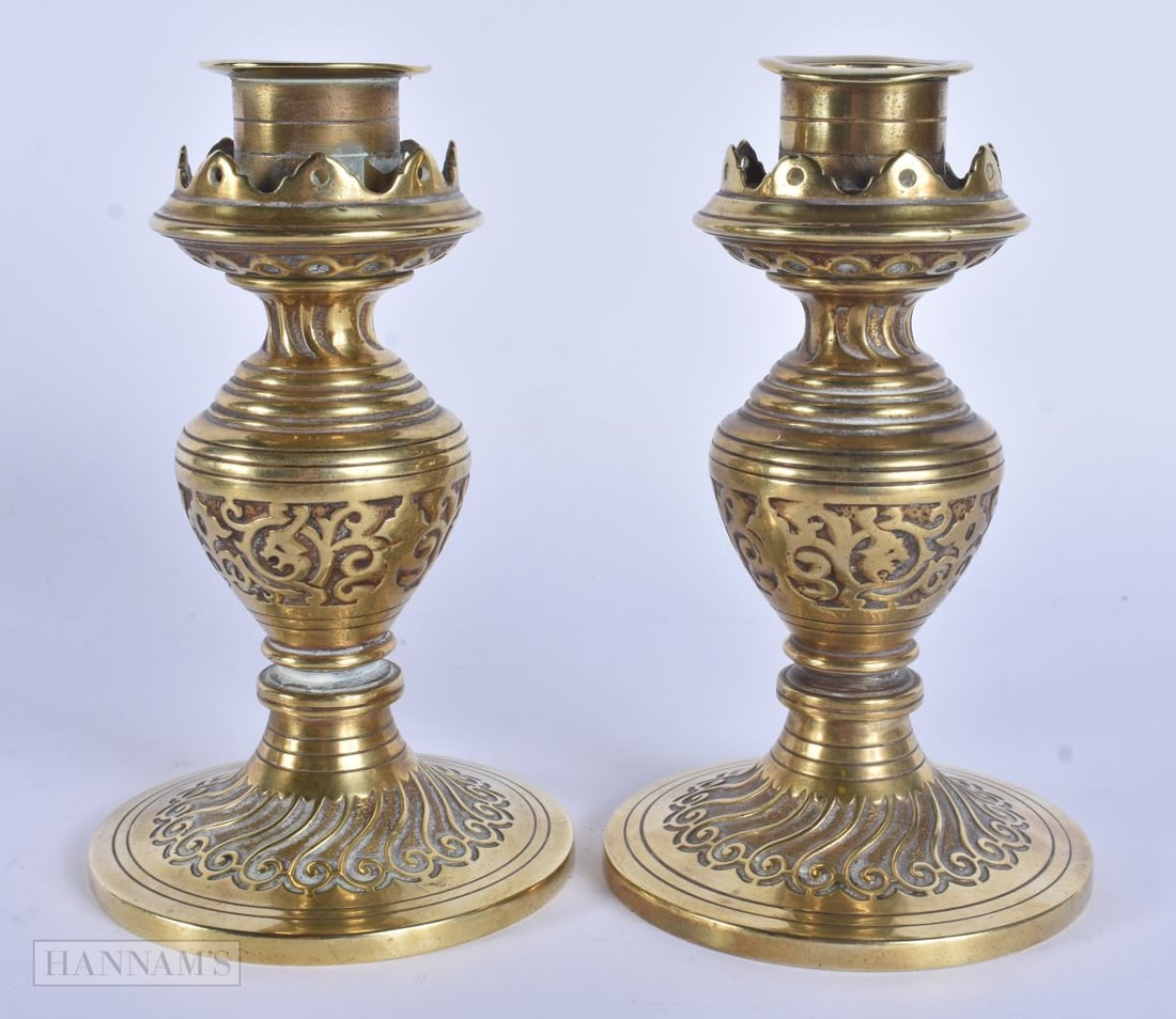 A PAIR OF VICTORIAN WILLIAM TONKS & SONS GOTHIC REVIVAL CANDLESTICKS. 15cm high.: A PAIR OF VICTORIAN WILLIAM TONKS & SONS GOTHIC REVIVAL CANDLESTICKS. 15cm high.