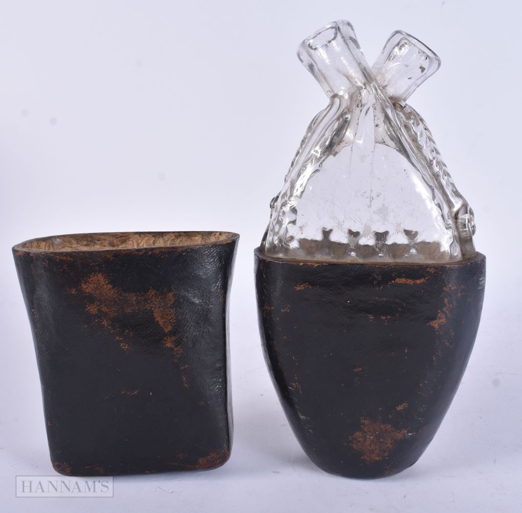 A RARE 18TH CENTURY ENGLISH LEATHER CASED GLASS OIL AND VINEGAR FLASK. 21 cm x 8 cm.: A RARE 18TH CENTURY ENGLISH LEATHER CASED GLASS OIL AND VINEGAR FLASK. 21 cm x 8 cm.
