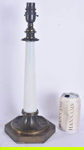 A VICTORIAN BRONZE OPALINE GLASS COUNTRY HOUSE LAMP. 41 cm high.: A VICTORIAN BRONZE OPALINE GLASS COUNTRY HOUSE LAMP. 41 cm high.