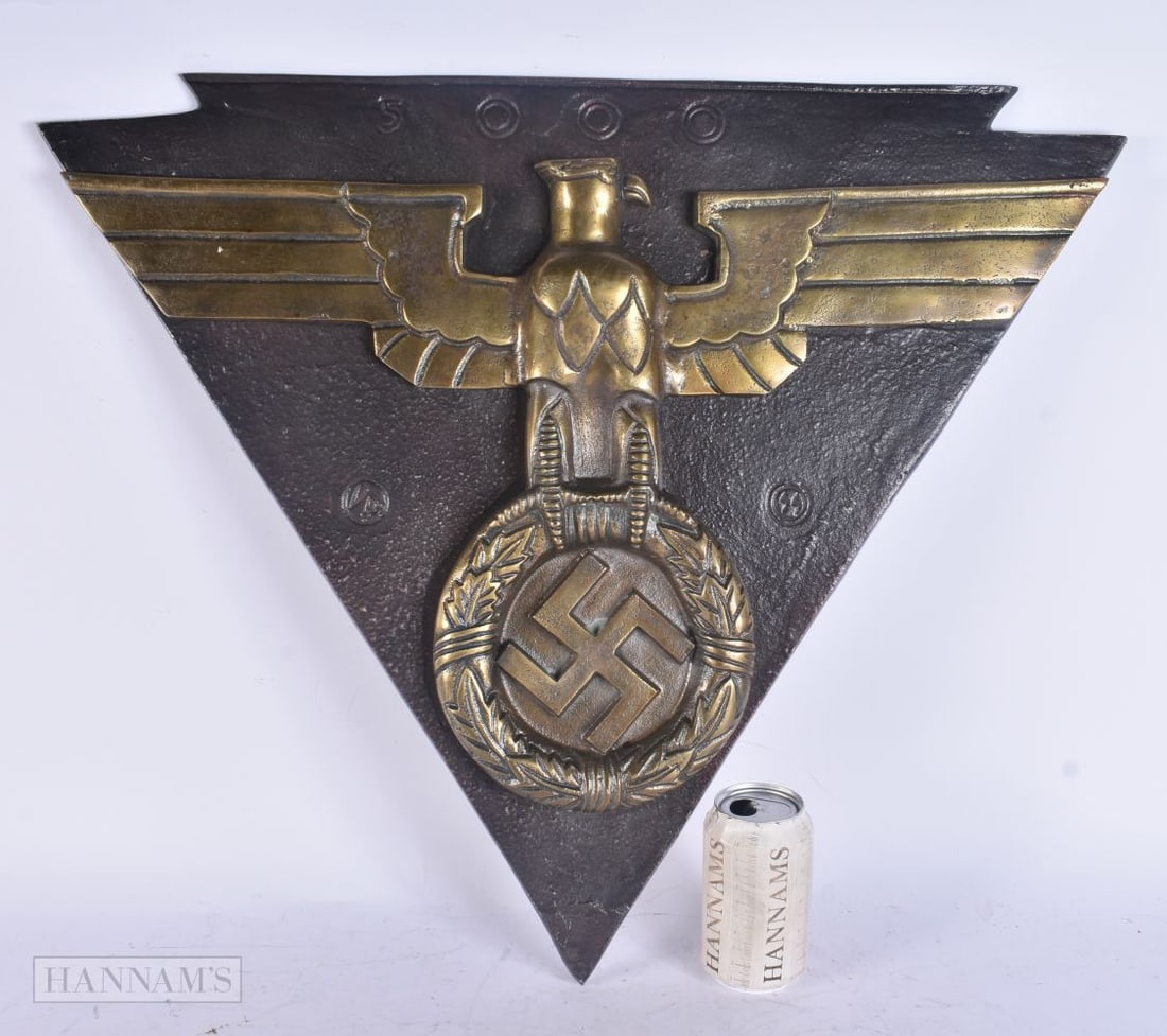 A CONTINENTAL GERMAN MILITARY IRON AND BRONZE PLAQUE. 55 cm x 52 cm. (1 of 4)