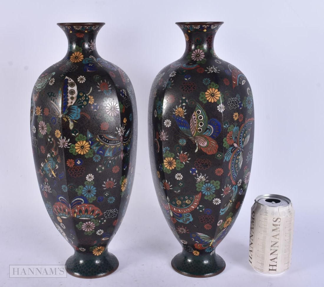 A LARGE PAIR OF 19TH CENTURY JAPANESE MEIJI PERIOD CLOISONNE ENAMEL VASES decorated with butterflies: A LARGE PAIR OF 19TH CENTURY JAPANESE MEIJI PERIOD CLOISONNE ENAMEL VASES decorated with butterflies and foliage. 38 cm x 12 cm.