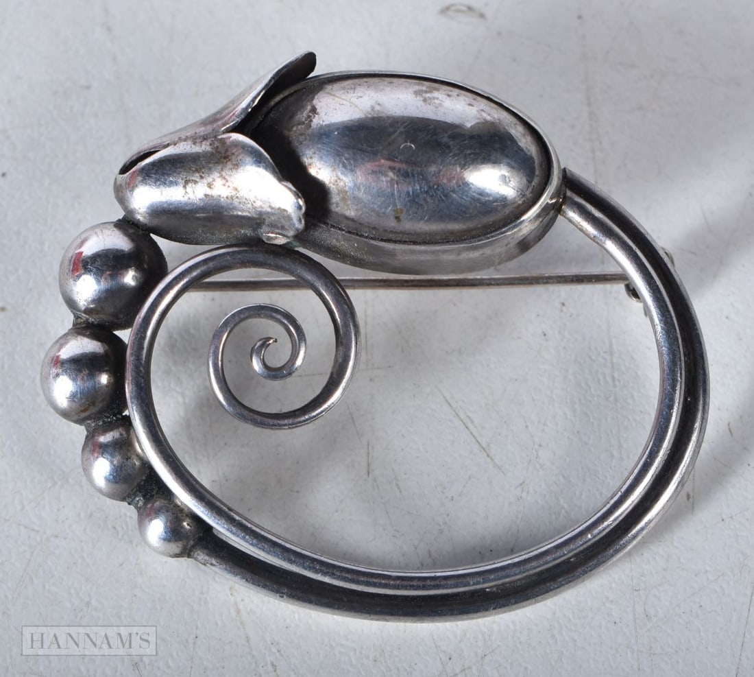 A Georg Jensen Silver Brooch. Stamped Jensen Sterling. 3.5 cm x 4.2 cm, weight 13.3g: A Georg Jensen Silver Brooch. Stamped Jensen Sterling. 3.5 cm x 4.2 cm, weight 13.3g