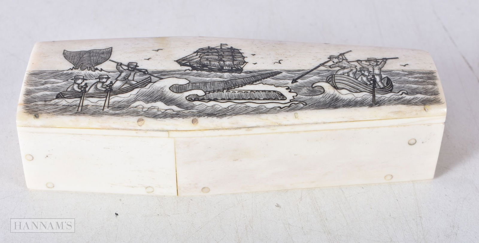 A Bone Coffin decorated with a Whaling Scene. 11.6 cm x 4.3 cm x 2.8cm, weight 137g: A Bone Coffin decorated with a Whaling Scene. 11.6 cm x 4.3 cm x 2.8cm, weight 137g