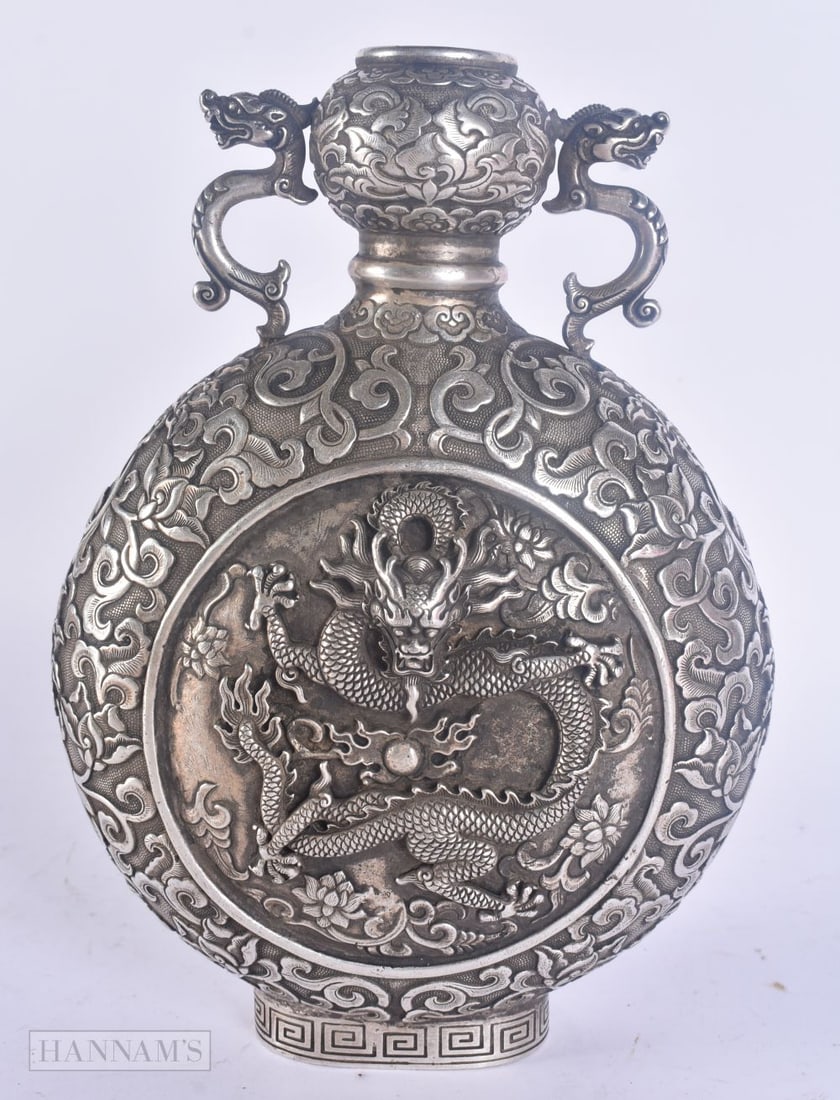 A CHINESE WHITE METAL TWIN HANDLED DRAGON PILGRIM FLASK. 22 cm x 14 cm.: A CHINESE WHITE METAL TWIN HANDLED DRAGON PILGRIM FLASK. 22 cm x 14 cm.