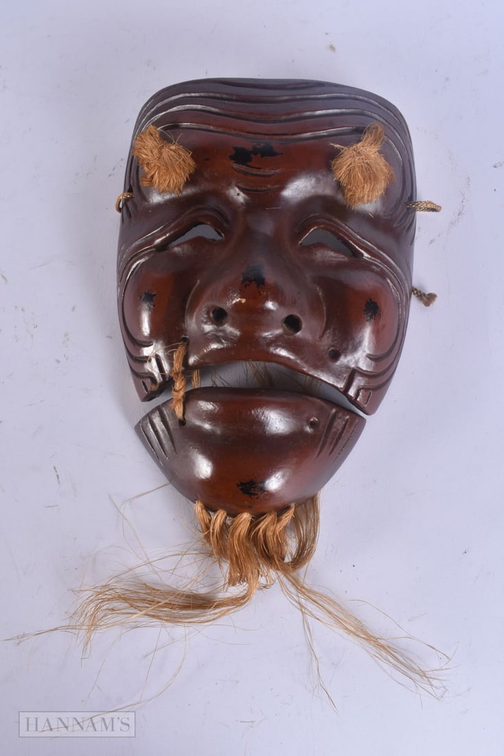 A 19TH CENTURY JAPANESE MEIJI PERIOD NEGORO LACQUERED MASK. 20 cm x 14 cm.: A 19TH CENTURY JAPANESE MEIJI PERIOD NEGORO LACQUERED MASK. 20 cm x 14 cm.