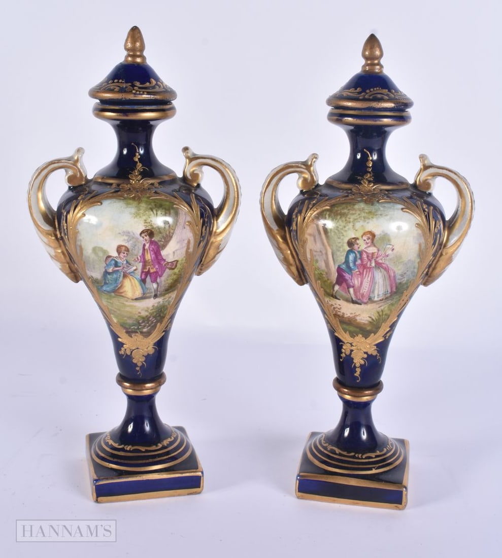 A PAIR OF 19TH CENTURY FRENCH SEVRES STYLE PORCELAIN VASES AND COVERS. 23 cm high. (1 of 6)