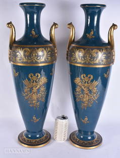 A VERY LARGE PAIR OF ANTIQUE FRENCH JEAN POUYAT LIMOGES VASES painted and gilded with foliage and be: A VERY LARGE PAIR OF ANTIQUE FRENCH JEAN POUYAT LIMOGES VASES painted and gilded with foliage and beasts. 60 cm high.