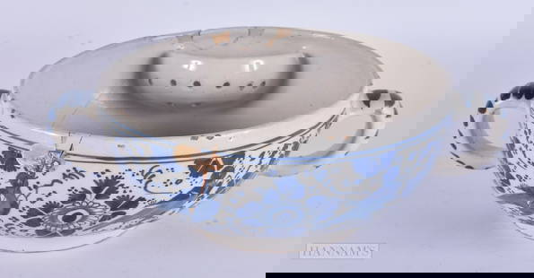 A LARGE 18TH CENTURY DUTCH DELFT TIN GLAZED BLUE AND WHITE POTTERY BOWL. 27 cm wide.: A LARGE 18TH CENTURY DUTCH DELFT TIN GLAZED BLUE AND WHITE POTTERY BOWL. 27 cm wide.