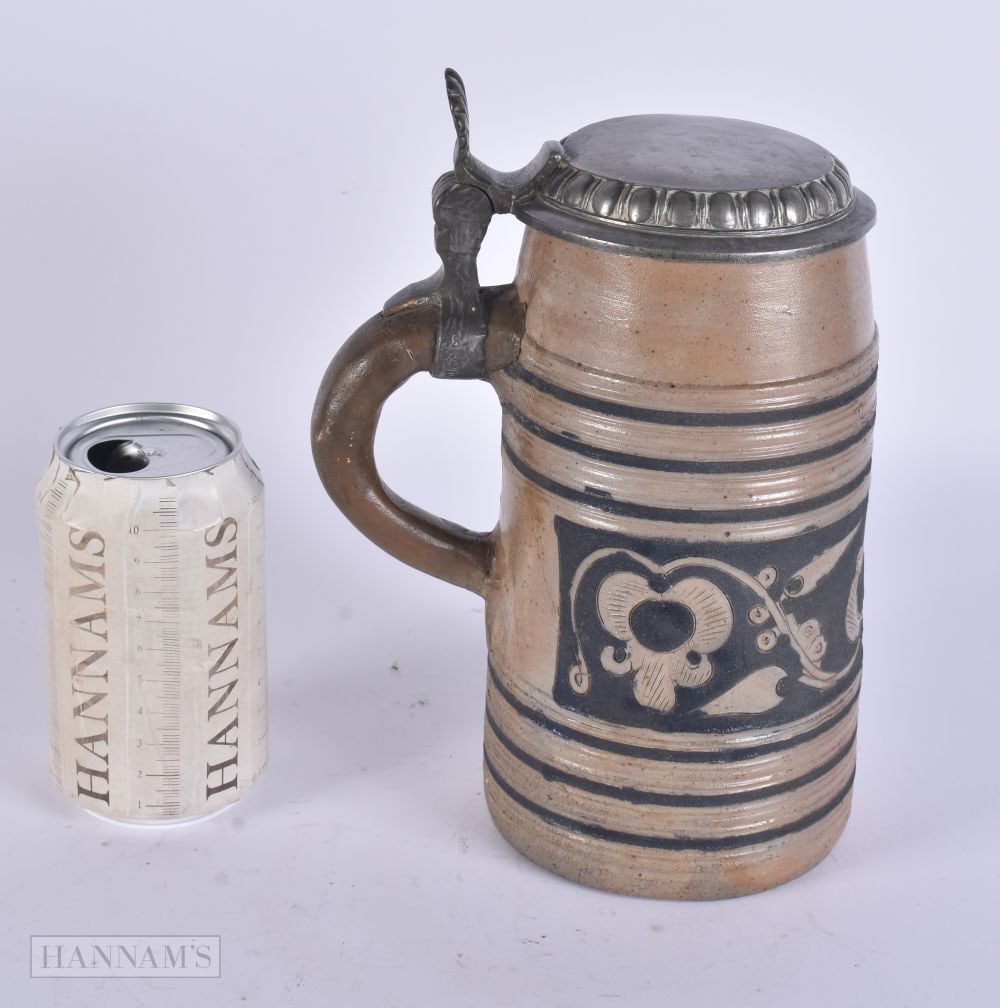 AN 18TH CENTURY CONTINENTAL SALT GLAZED STONEWARE STEIN. 23.5 cm high. (1 of 4)