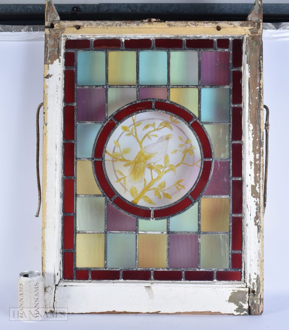 AN ANTIQUE STAINED GLASS BIRD WINDOW. 80 cm x 50 cm. (1 of 2)