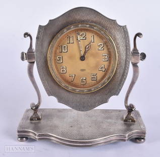 AN ART DECO SILVER DESK CLOCK. 364 grams overall. 11.5 cm x 11 cm.: AN ART DECO SILVER DESK CLOCK. 364 grams overall. 11.5 cm x 11 cm.