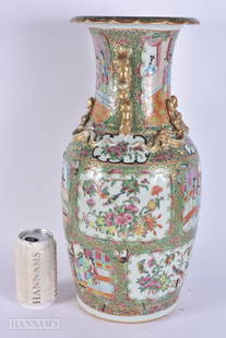 A LARGE 19TH CENTURY CHINESE CANTON FAMILLE ROSE VASE Qing. 48 cm high.: A LARGE 19TH CENTURY CHINESE CANTON FAMILLE ROSE VASE Qing. 48 cm high.