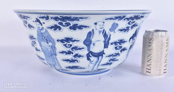 A VERY LARGE EARLY 20TH CENTURY CHINESE BLUE AND WHITE PORCELAIN BOWL Late Qing, painted with immort: A VERY LARGE EARLY 20TH CENTURY CHINESE BLUE AND WHITE PORCELAIN BOWL Late Qing, painted with immortals amongst clouds. 36 cm x 17 cm.